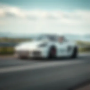 Dynamic driving shot of the 2022 Porsche 718 Spyder on the road