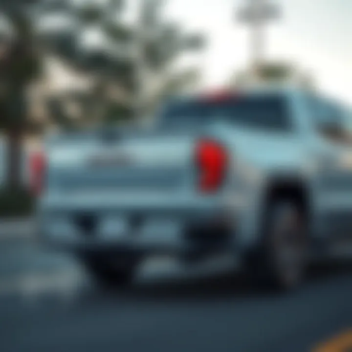 Hybrid Capabilities of 2018 GMC Sierra eAssist Rear View Rear view of the 2018 GMC Sierra eAssist demonstrating its hybrid capabilities