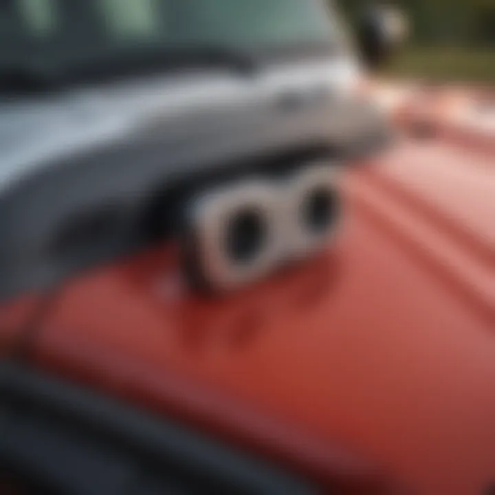 Maintenance routine for a Jeep hood latch illustrating upkeep and durability.