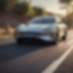 A sleek modern electric vehicle on a scenic road