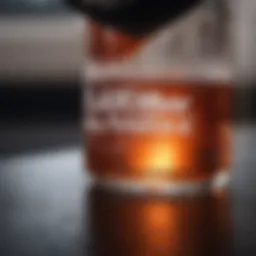Close-up of clean transmission fluid in a clear container