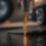 Vehicle engine oil dipstick showing oil level