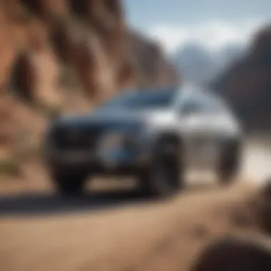 A Hyundai SUV driving on rugged terrain demonstrating performance