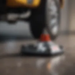 A close-up of a hydraulic floor jack showcasing its intricate design.