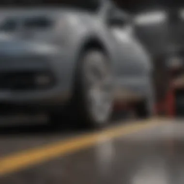 Vehicle undergoing a tire inspection in a garage