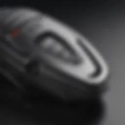 Close-up of a modern car key opener mechanism showcasing intricate design.