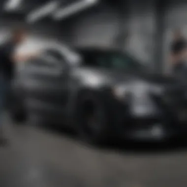 Professional Application of Vinyl Wrap Labor team applying satin black vinyl wrap to a car