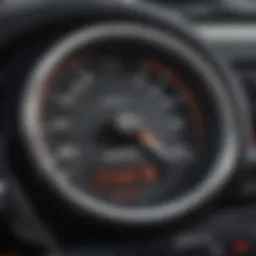 Close-up of a vehicle dashboard displaying mileage metrics