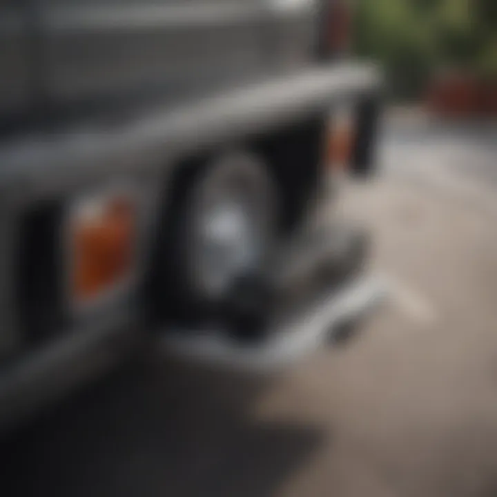 A close-up view of safety features integrated into an enclosed hitch mounted cargo carrier.