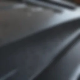 A close-up view of a freshly painted vehicle hood showcasing the glossy finish.