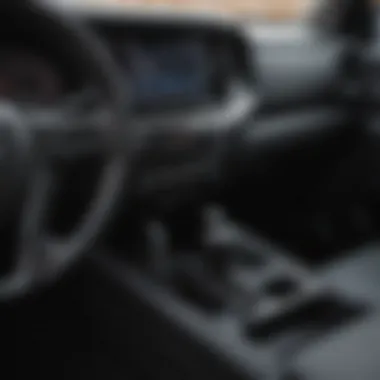 Interior Insights of the Nissan Frontier Close-up of the 2022 Nissan Frontier's dashboard and controls